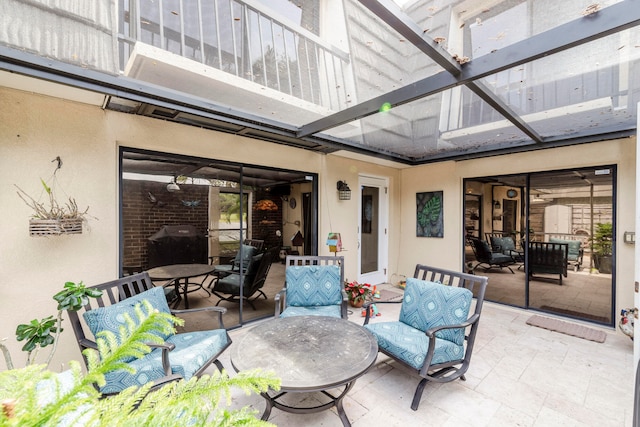 view of patio with a balcony