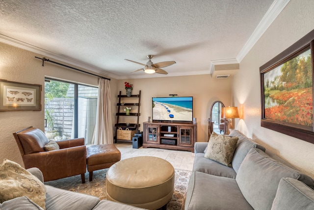 living room featuring a textured ceiling, crown molding, and ceiling fan