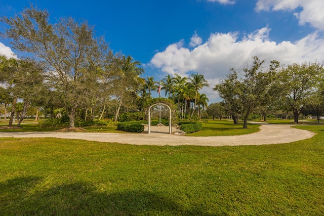 view of jungle gym featuring a lawn