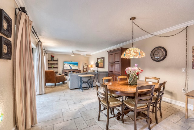 dining room with ornamental molding, a textured ceiling, and ceiling fan