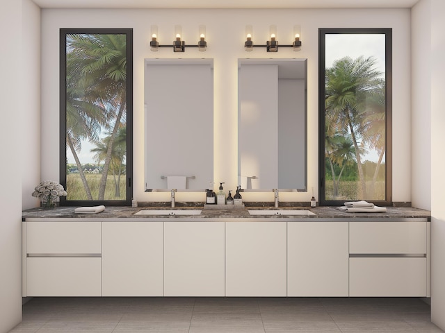 bathroom with tile floors and double sink vanity