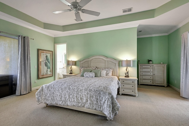 carpeted bedroom featuring crown molding and ceiling fan