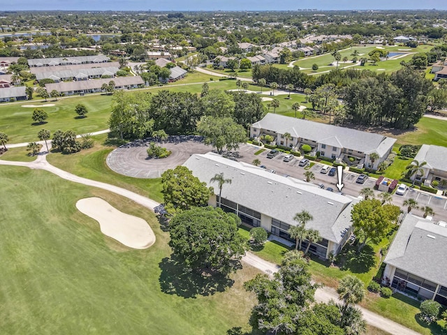 aerial perspective of suburban area with a golf course