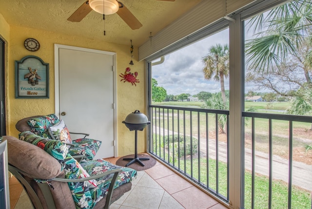 balcony featuring ceiling fan