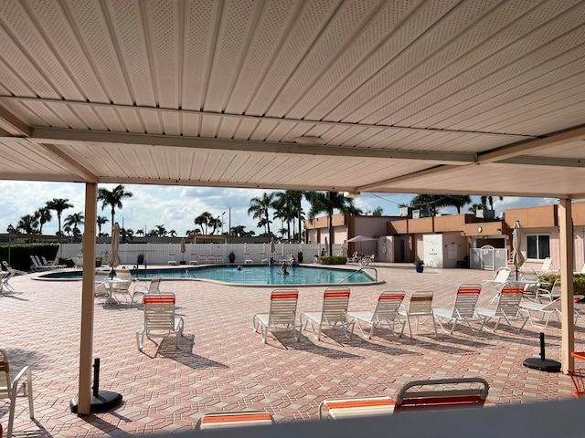 view of swimming pool with a patio area