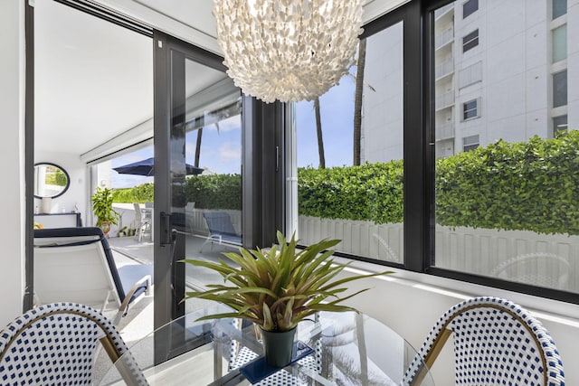 dining space with a notable chandelier