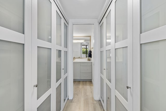 hallway featuring light wood-type flooring