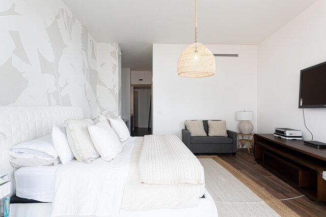 bedroom featuring hardwood / wood-style floors