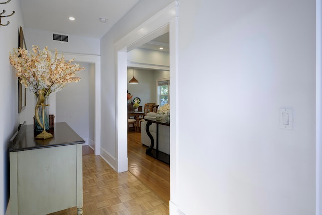 hallway with visible vents and recessed lighting