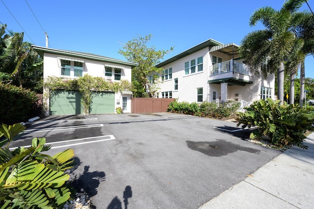 view of front of home featuring an attached garage and stucco siding