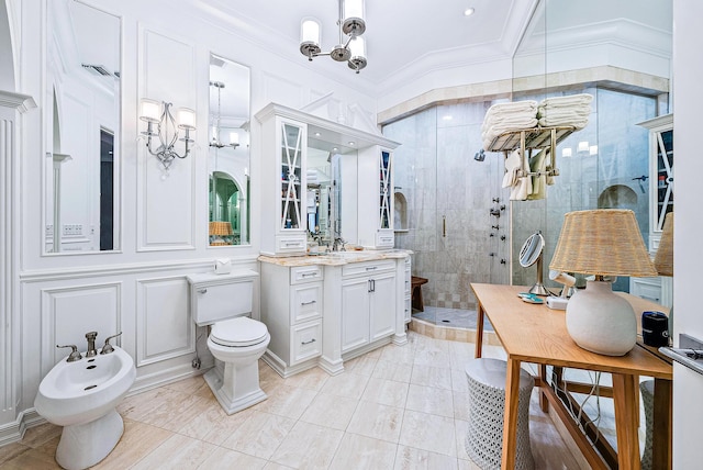 bathroom featuring a shower with shower door, a chandelier, toilet, a bidet, and oversized vanity