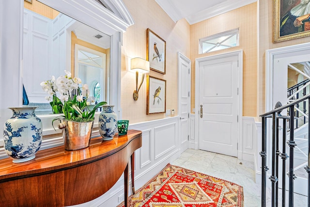 tiled entryway with crown molding