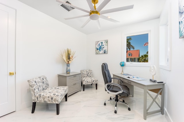 office space with ceiling fan