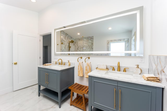 bathroom with a shower and vanity