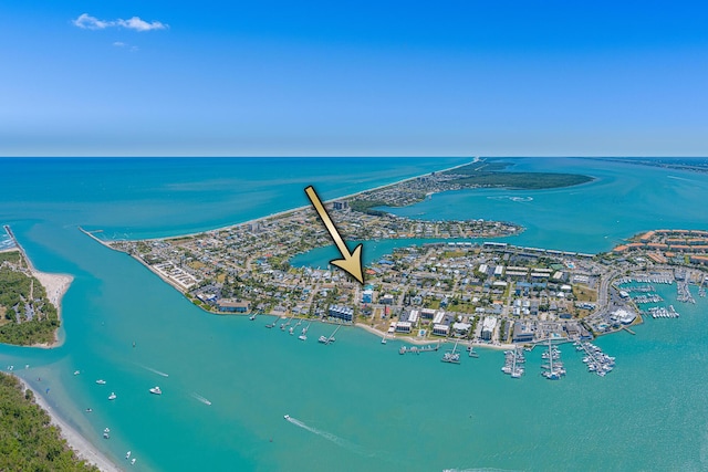 bird's eye view featuring a beach view and a water view