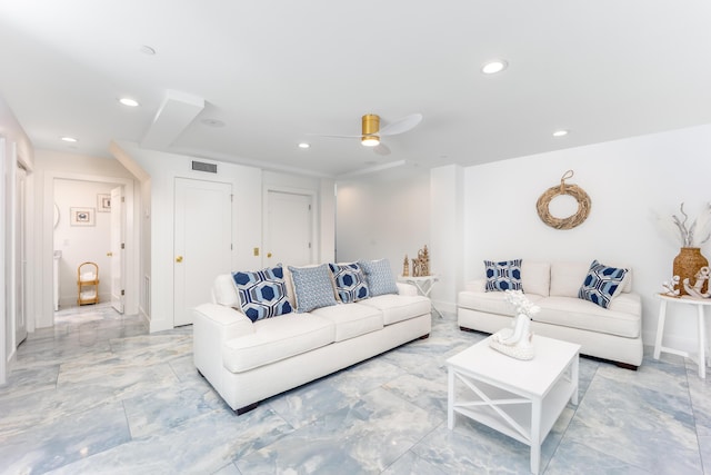 living room featuring ceiling fan