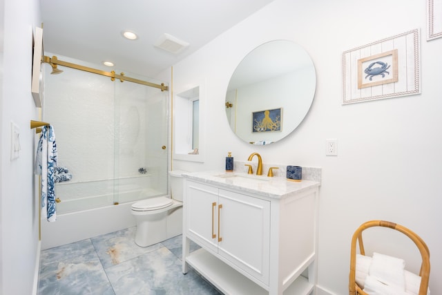 full bathroom featuring toilet, shower / bath combination with glass door, and vanity