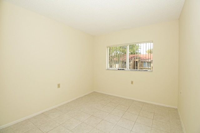 view of tiled spare room