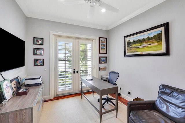 office with light hardwood / wood-style floors, ceiling fan, french doors, and crown molding