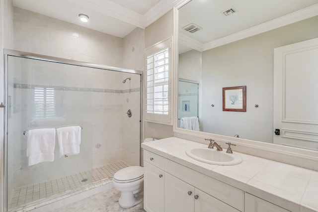 bathroom with toilet, crown molding, an enclosed shower, a healthy amount of sunlight, and oversized vanity