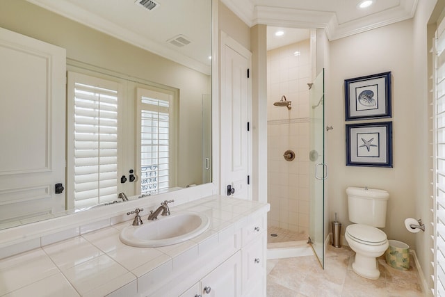 bathroom featuring toilet, vanity, tiled shower, ornamental molding, and tile flooring