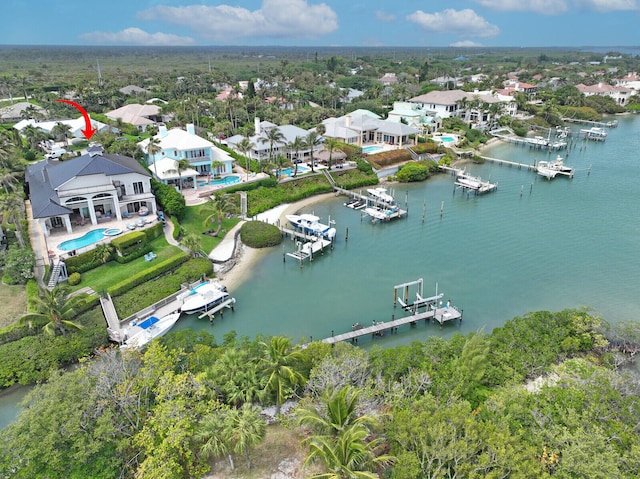 birds eye view of property featuring a water view