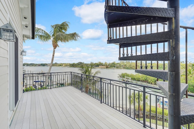 deck featuring a water view