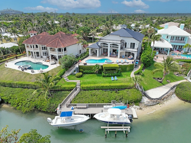 drone / aerial view with a water view