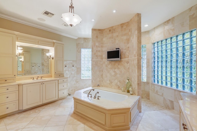 bathroom with tile walls, crown molding, a bath to relax in, tile flooring, and large vanity