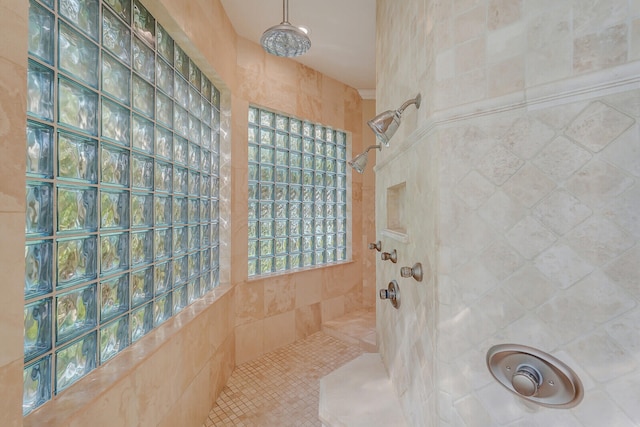 bathroom featuring tiled shower