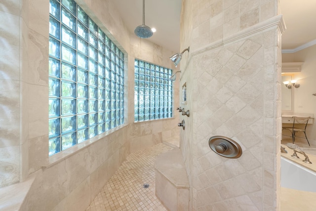 bathroom with a tile shower and crown molding