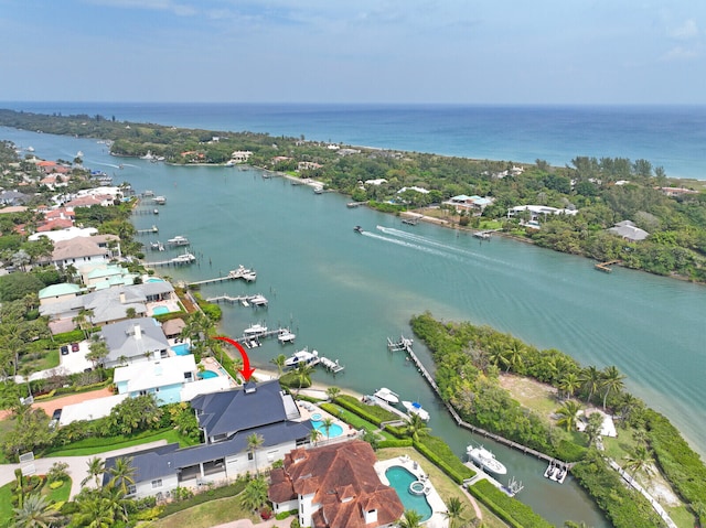 drone / aerial view featuring a water view