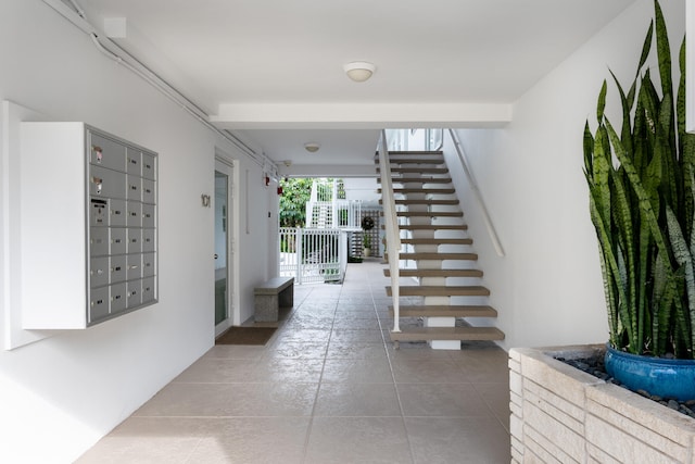 hall with light tile floors