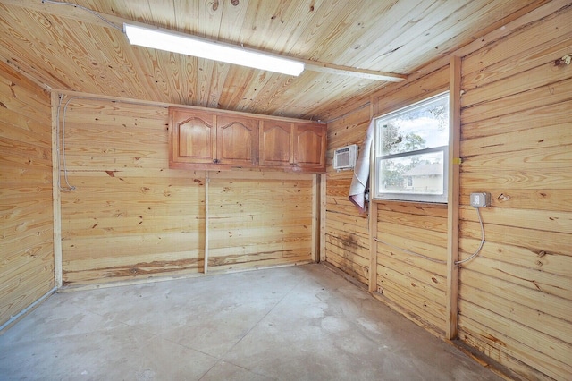 empty room featuring wood ceiling, wooden walls, and an AC wall unit