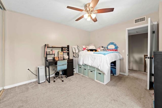 bedroom featuring light carpet and ceiling fan