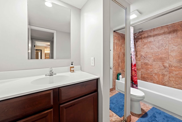 full bathroom featuring large vanity, tile flooring, shower / bath combo, and toilet