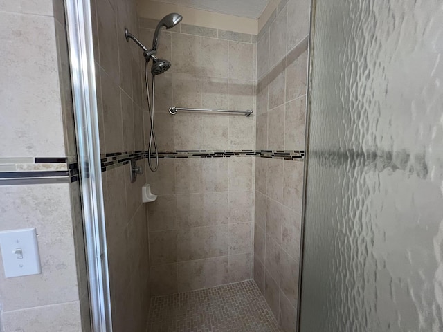 bathroom with a stall shower