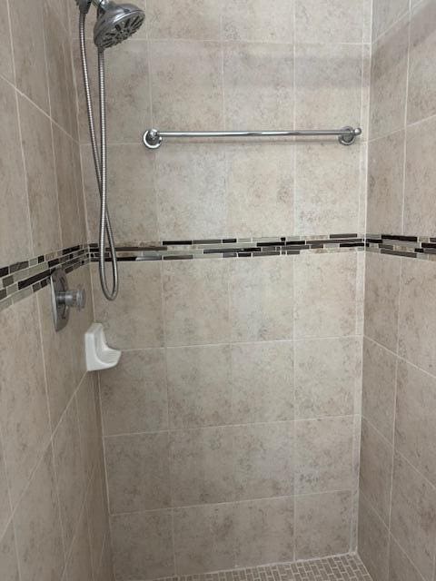 bathroom featuring a stall shower