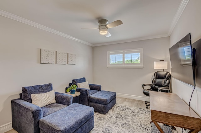 sitting room with crown molding, light hardwood / wood-style floors, and ceiling fan