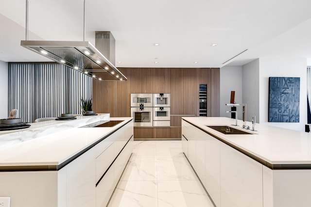 kitchen featuring a kitchen island, light tile floors, black electric cooktop, white cabinets, and sink