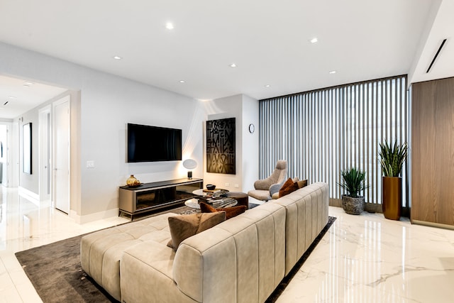 living room featuring light tile floors