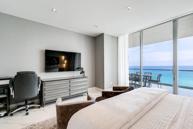 tiled bedroom featuring expansive windows, access to exterior, and a water view