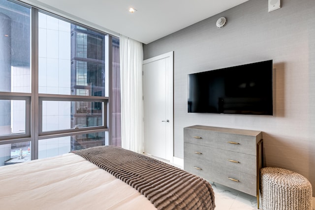 bedroom featuring light tile flooring