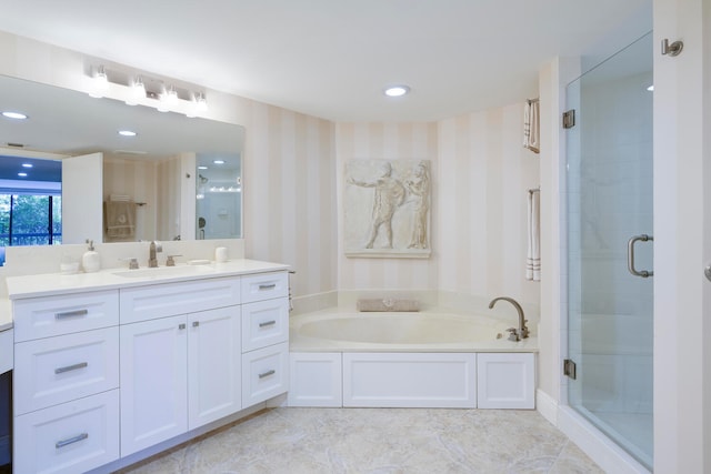 bathroom featuring tile floors, vanity, and independent shower and bath