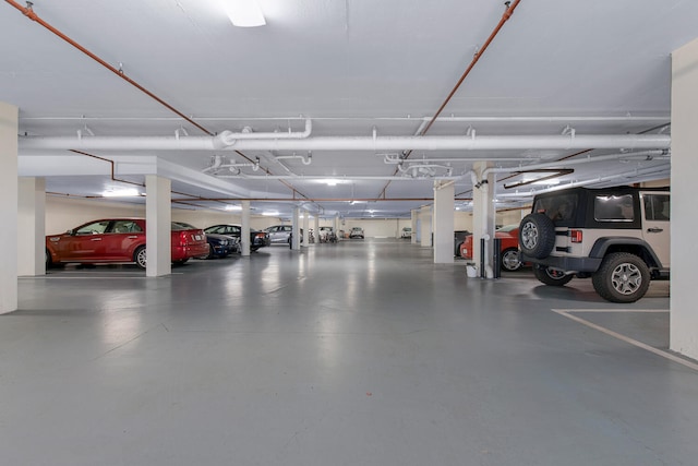 garage featuring a carport