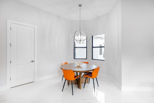 dining room with a chandelier