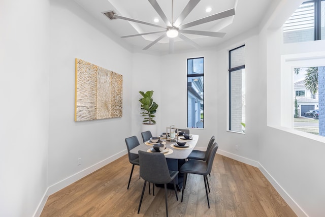 dining room featuring ceiling fan and wood-type flooring