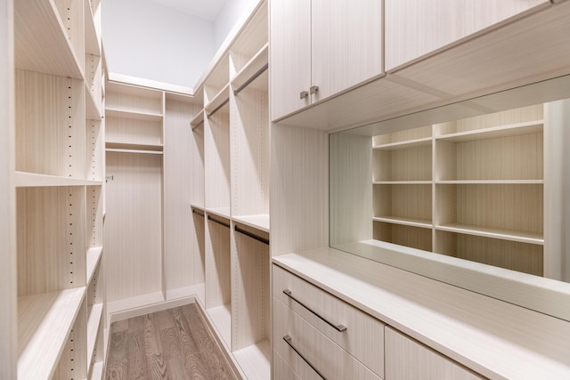 walk in closet featuring light wood-type flooring