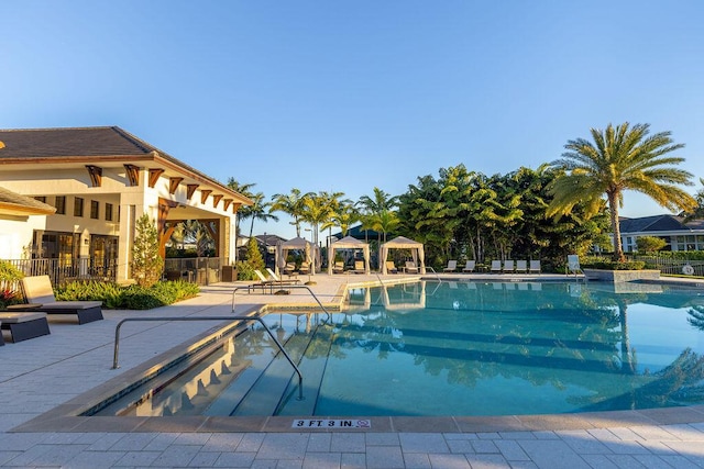 view of pool with a gazebo and a patio