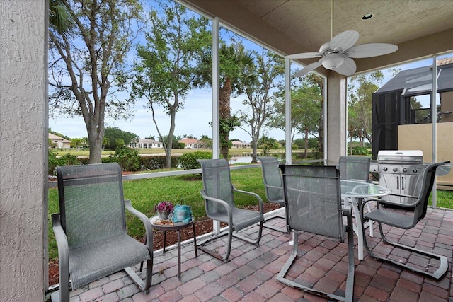 view of patio featuring ceiling fan